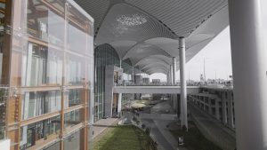 Glass elevator and modern architecture at the Istanbul airport VIP service meeting point.